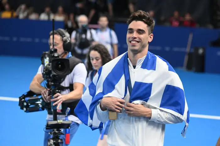 Unser Foto (© Eurokinissi) zeigt den griechischen Schwimmer Apostolos Christou nach seinem silbernen Triumph in der Disziplin 200 Meter Rückenschwimmen.